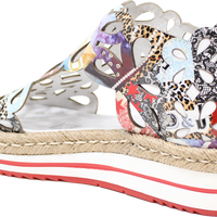 Multicolored wedge sandal with a patterned sole on a white background