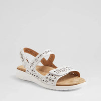 White sandal with wooden sole on a light gray background